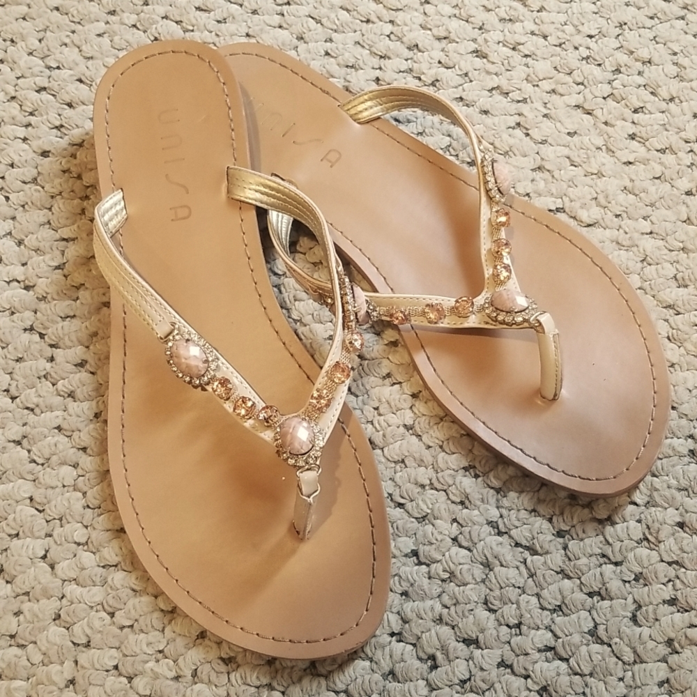 Neutral colored embellished sandals